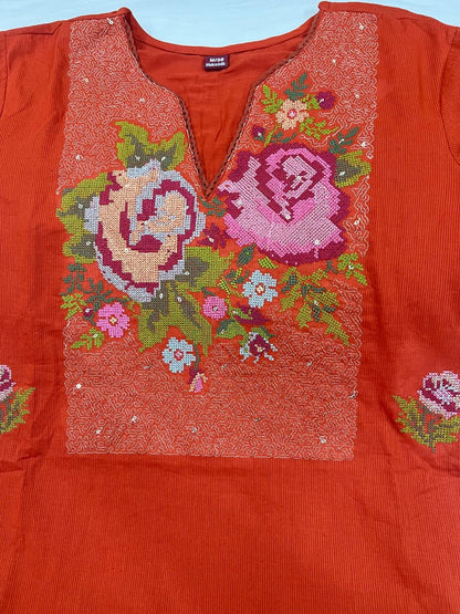 Soft cotton fabric texture of Rust Orange embroidered kurta set for women